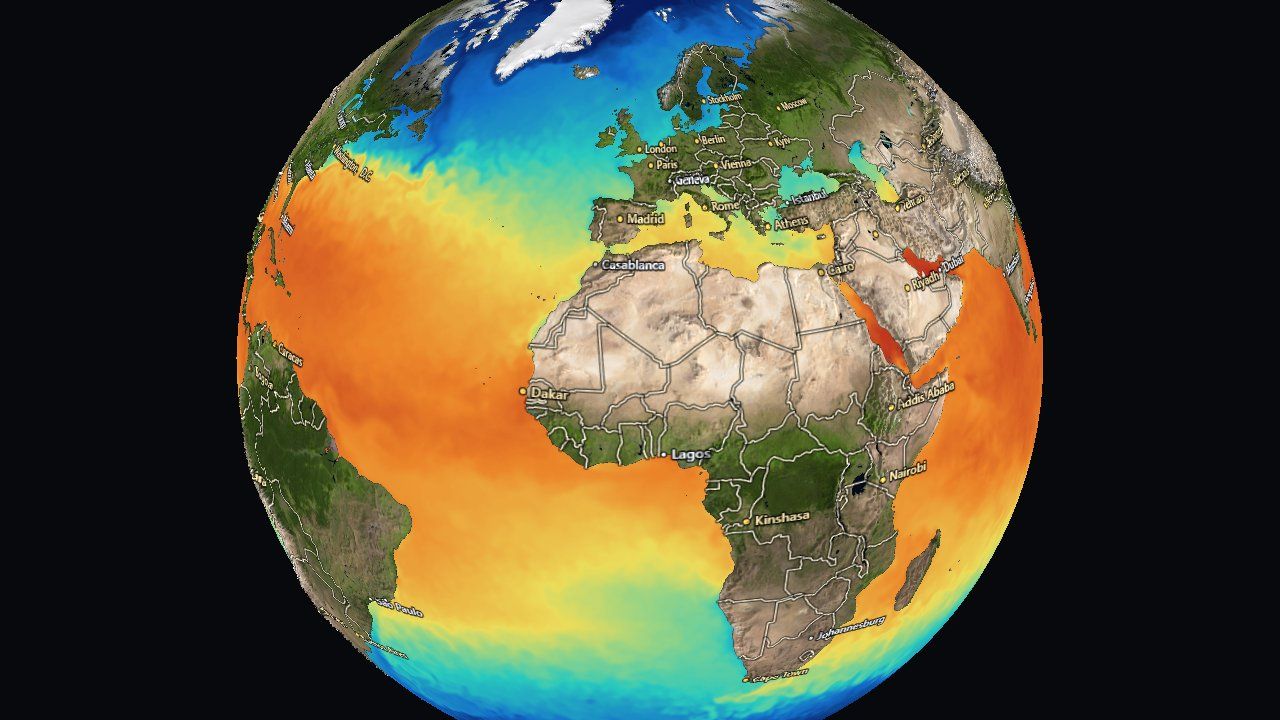 A globe colored by sea-surface temperature, warm orange in the tropics and blue toward the poles.